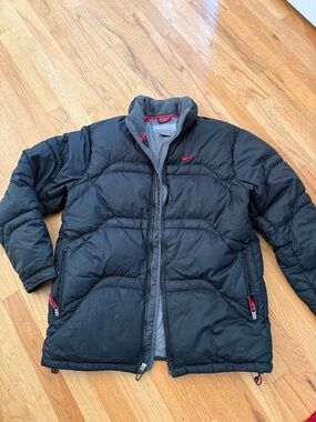 Nike Black Puffer Jacket with Red Logo Accents